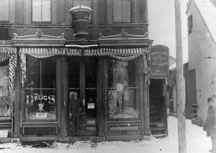 Picture of The Samuel Hoshour Drug Store (now the High Hats building in Cambridge City, Indiana). Circa 1880.